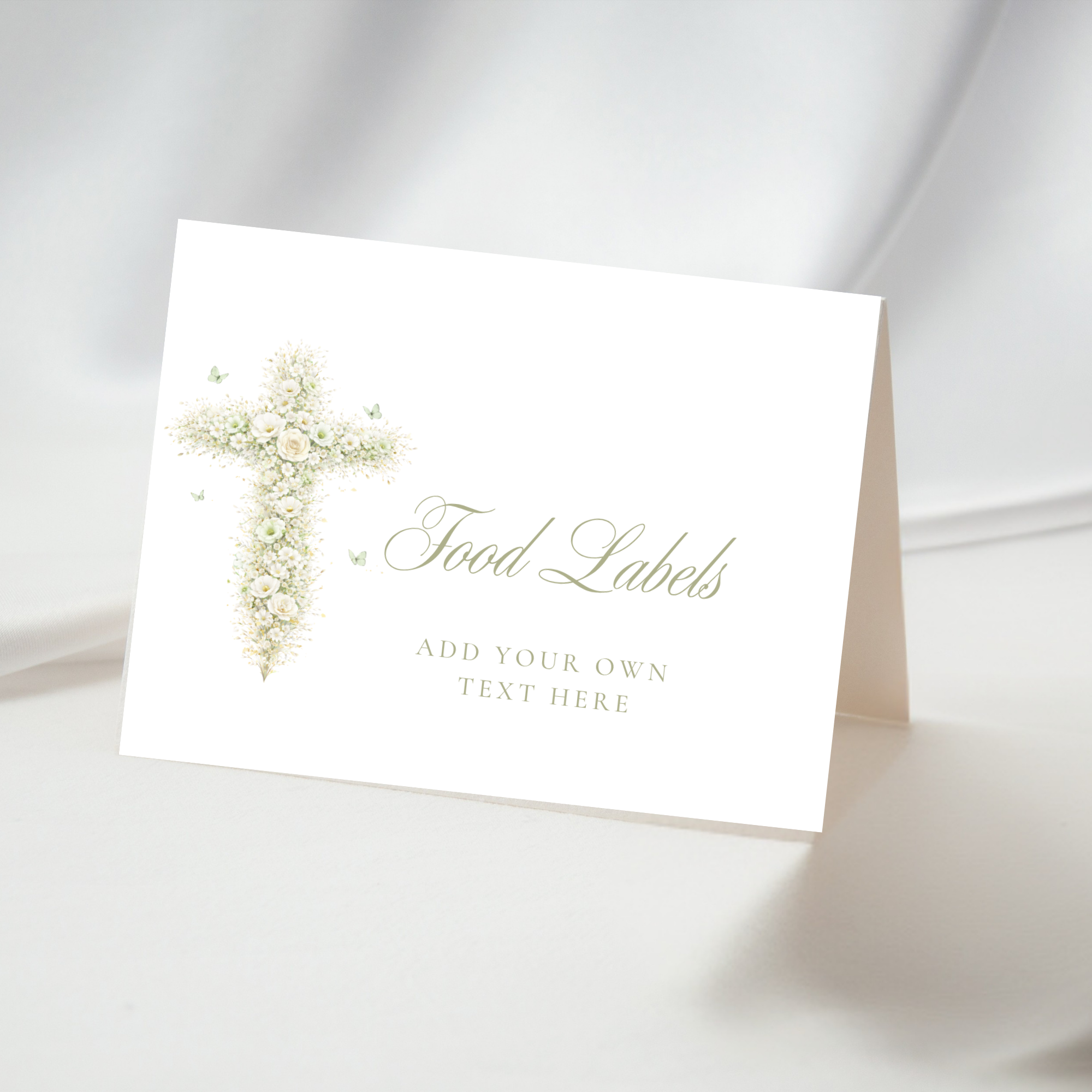 Elegant sage green floral baptism food labels with vintage floral cross editable in Canva for buffet tables and dessert displays