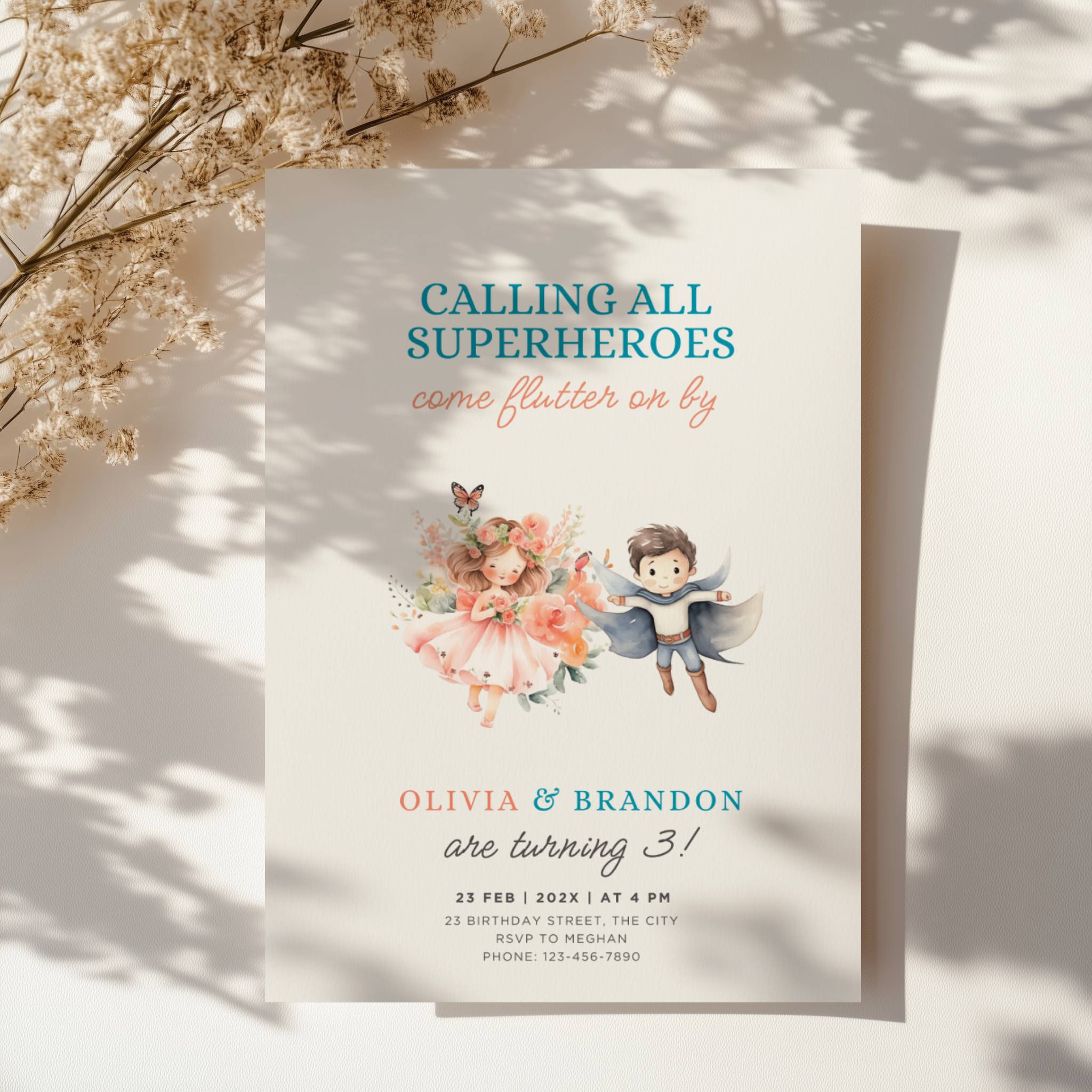 Boy girl twin birthday invitation with superhero boy and fairy girl illustration and floral accents