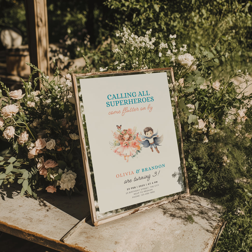 Boy girl twin birthday invitation with superhero boy and fairy girl illustration and floral accents