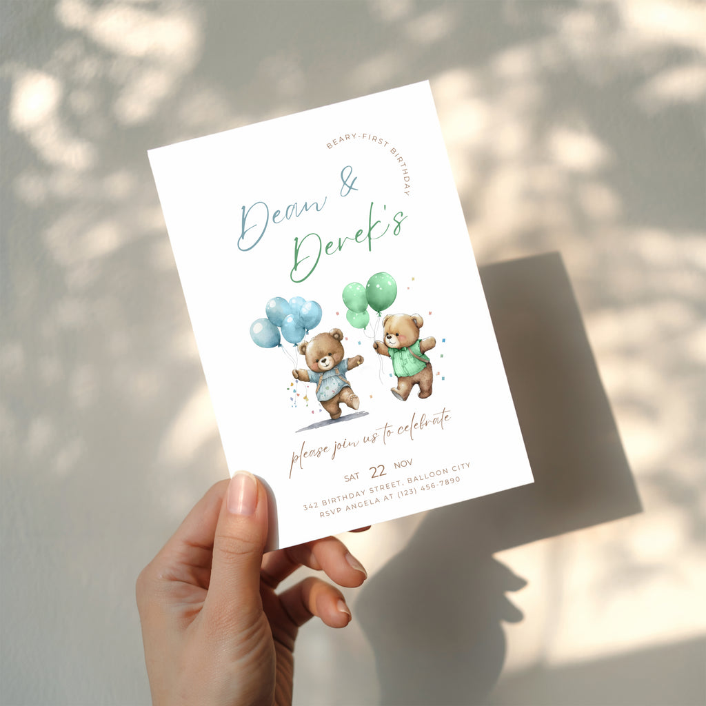 Beary first birthday boy twins invitation with teddy bear illustration and blue and green balloons