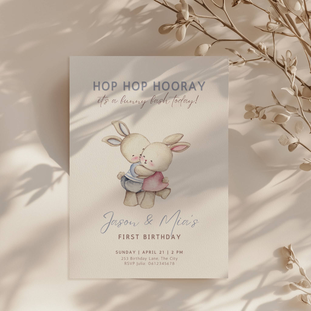 Easter boy girl twin birthday invitation with cute bunny illustration in soft pastel colors