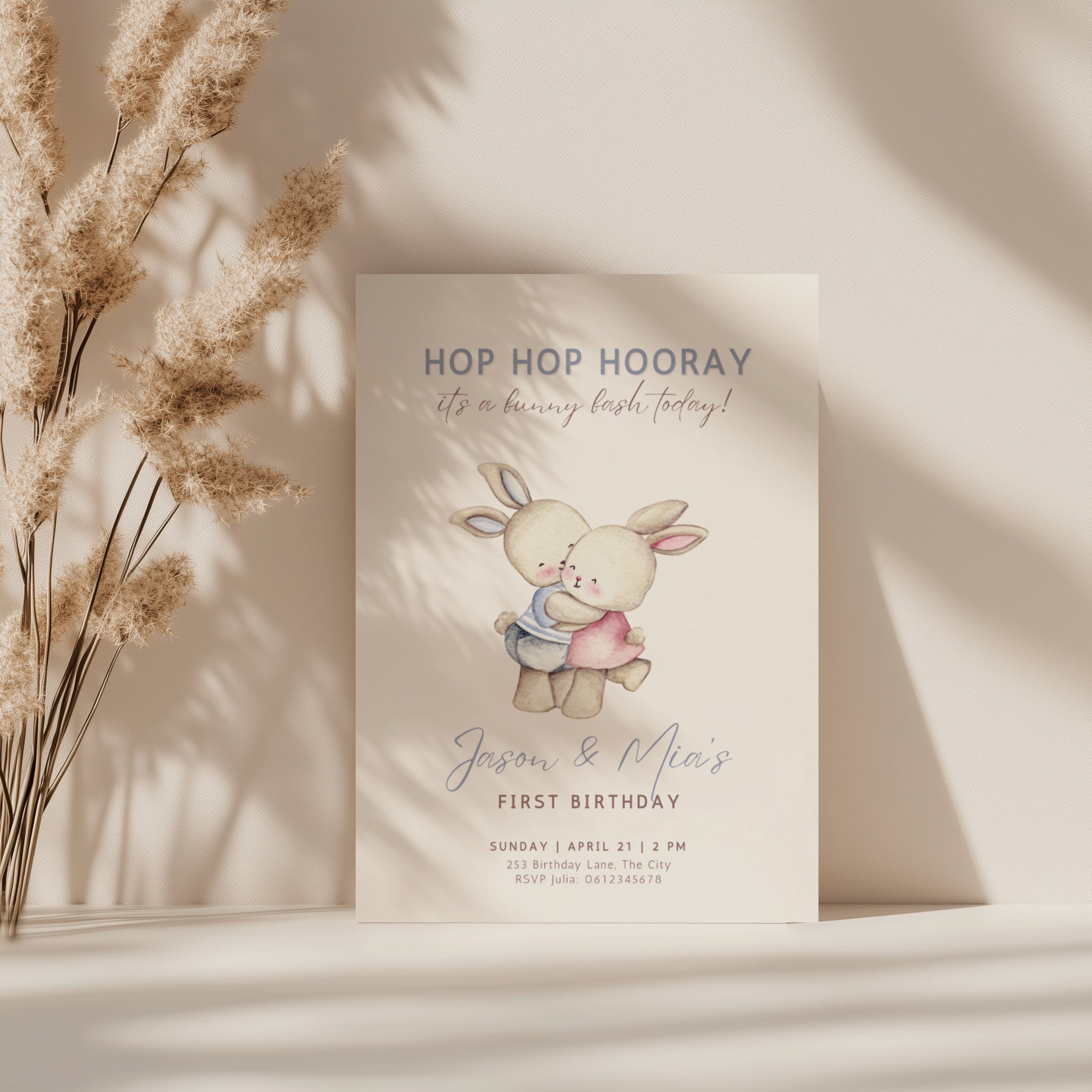 Easter boy girl twin birthday invitation with cute bunny illustration in soft pastel colors