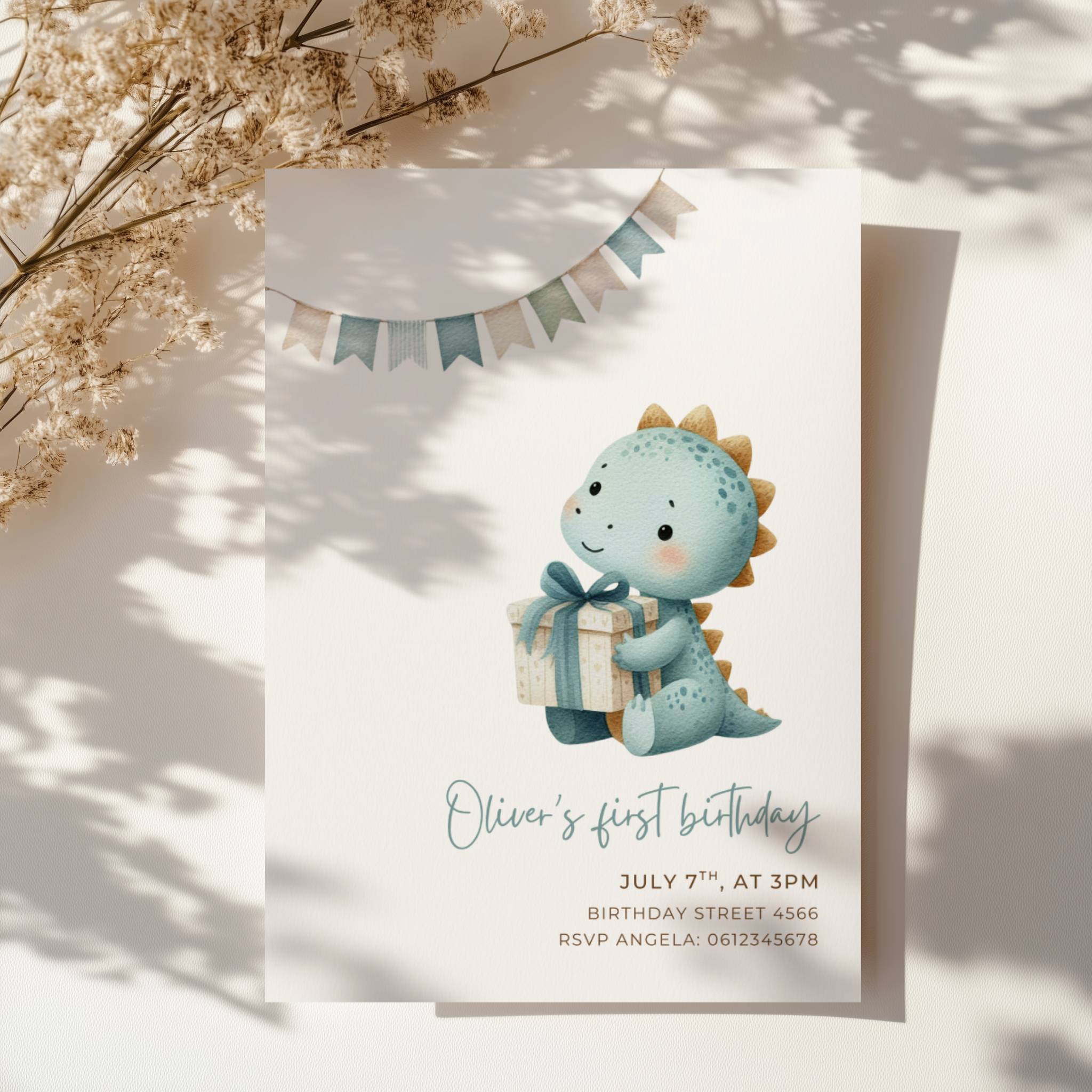 Dinosaur first birthday invitation with cute baby dinosaur holding a gift in soft pastel colors