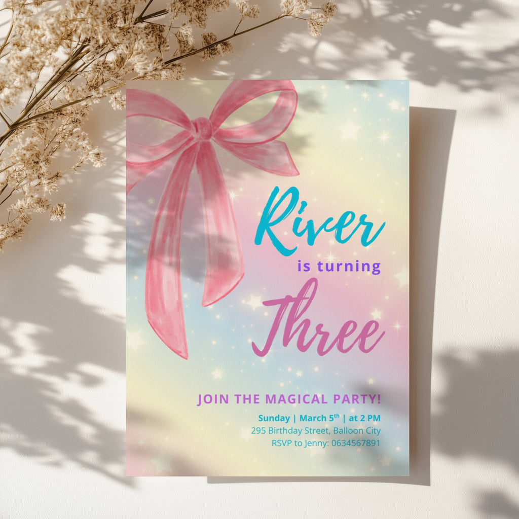Pastel rainbow birthday invitation with large pink bow and sparkles for a magical girls birthday party