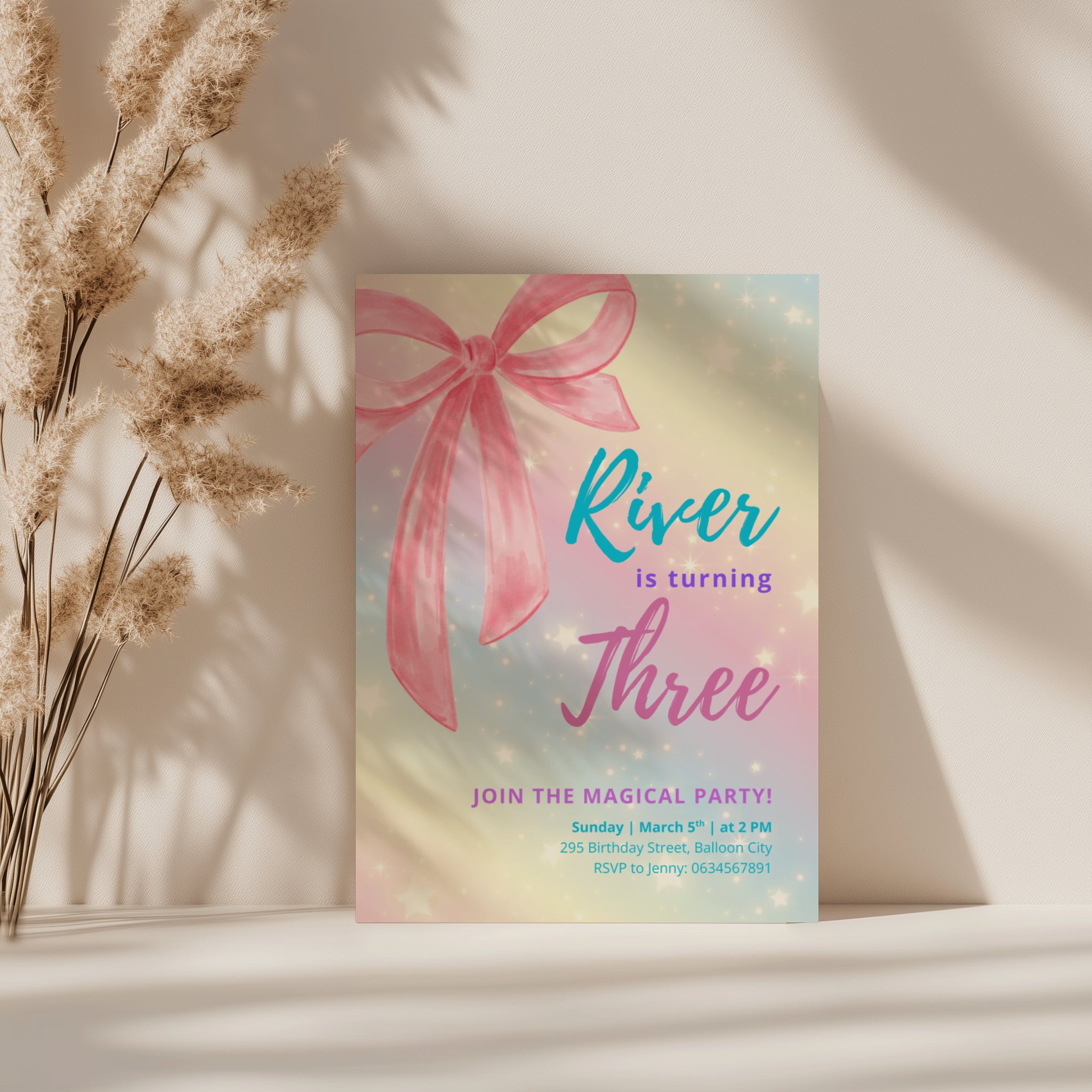 Pastel rainbow birthday invitation with large pink bow and sparkles for a magical girls birthday party