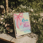 Pastel rainbow birthday invitation with large pink bow and sparkles for a magical girls birthday party