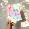 Pastel rainbow birthday invitation with large pink bow and sparkles for a magical girls birthday party