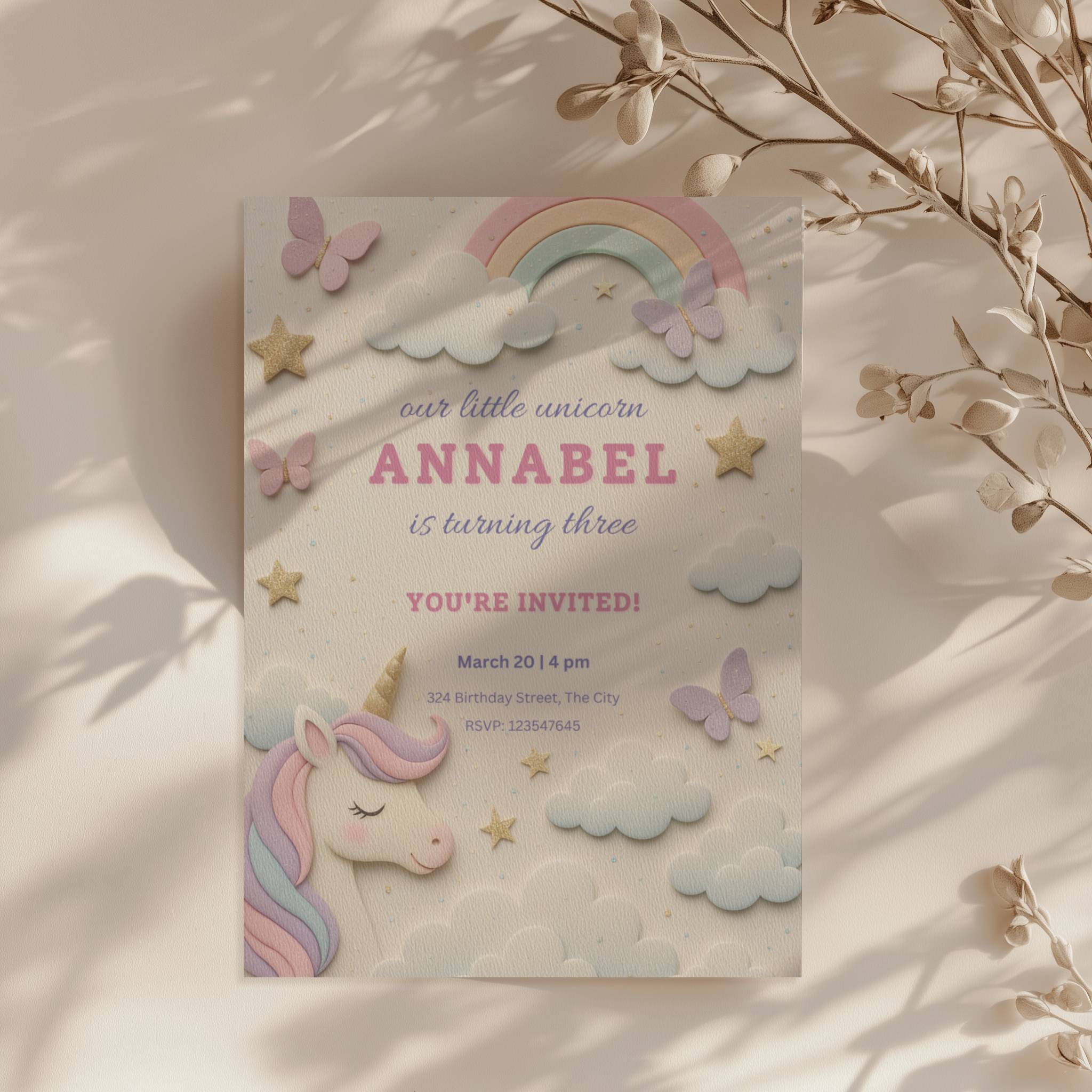 Pastel unicorn birthday invitation with rainbow, clouds and butterflies in soft colors for a magical girls party celebration