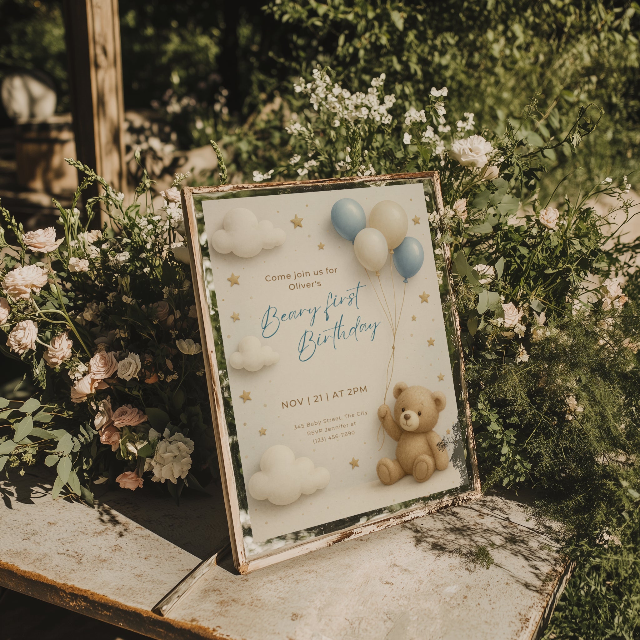 Beary first birthday invitation with teddy bear holding balloons in soft neutral colors with clouds and stars for a baby first birthday party
