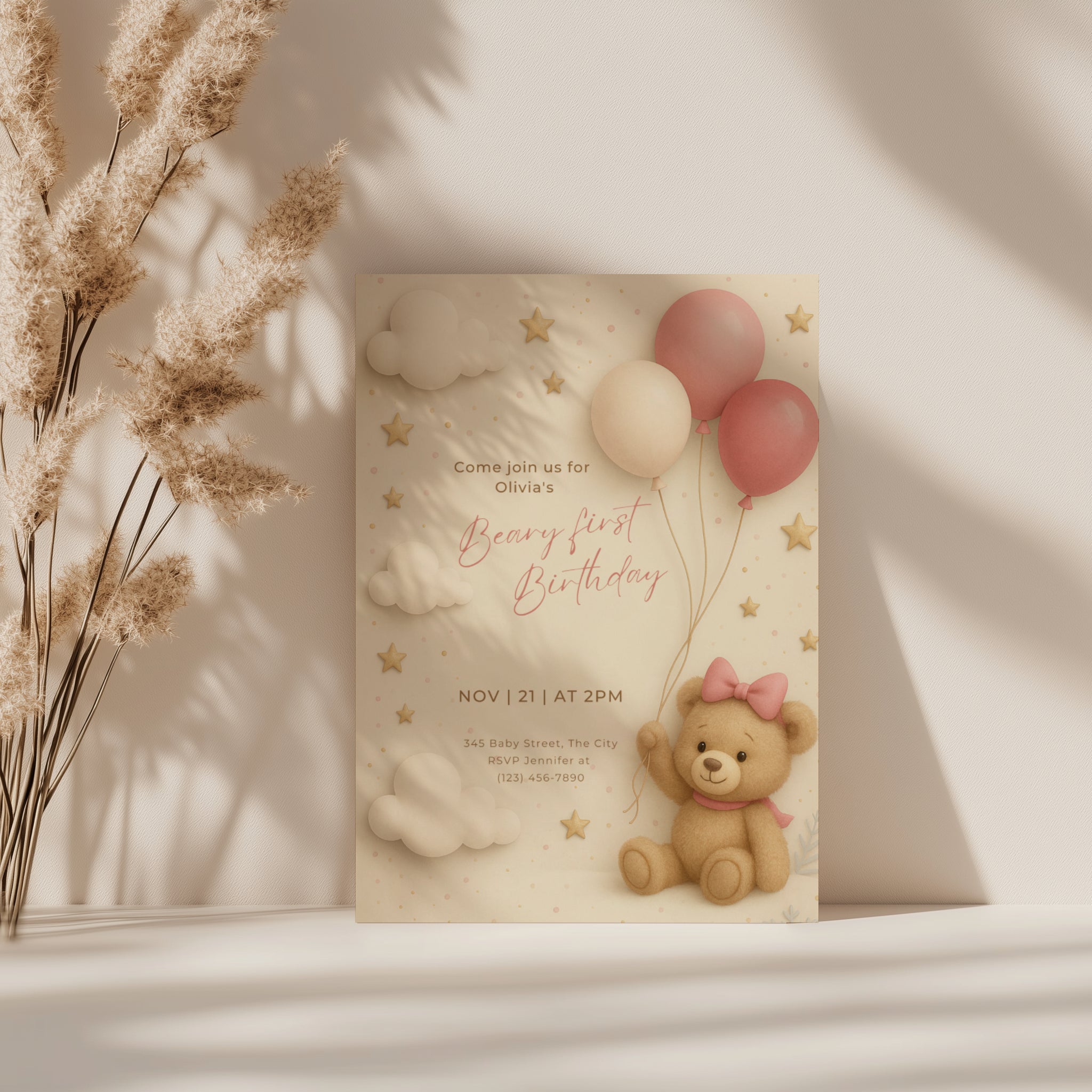 Beary first birthday invitation with teddy bear wearing a bow holding pink balloons in soft pastel colors for a baby girl first birthday party