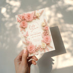 Soft pink baby shower invitation with floral roses and botanical elements in blush tones for an elegant baby girl celebration