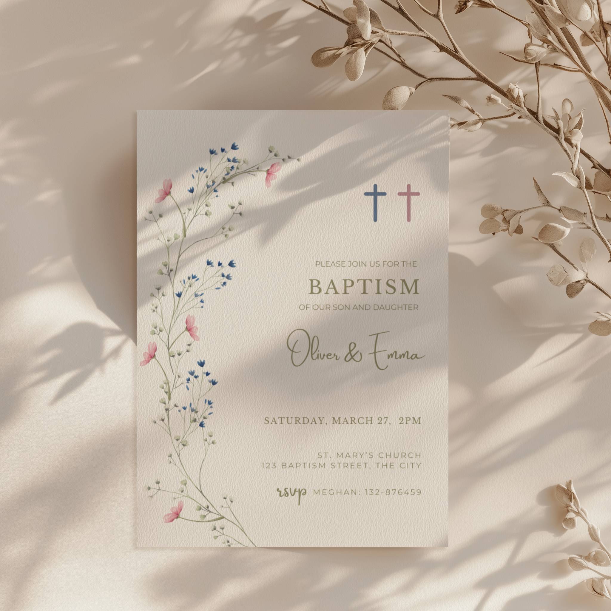 Floral baptism invitation for twins with blue and pink cross and delicate botanical elements for a sibling christening celebration