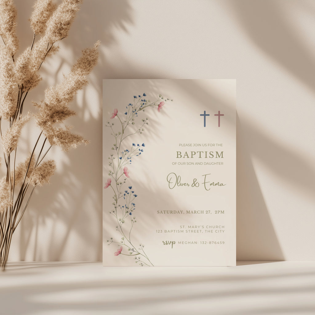 Floral baptism invitation for twins with blue and pink cross and delicate botanical elements for a sibling christening celebration
