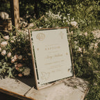 Embroidered baptism invitation with neutral background and stitched minimal design