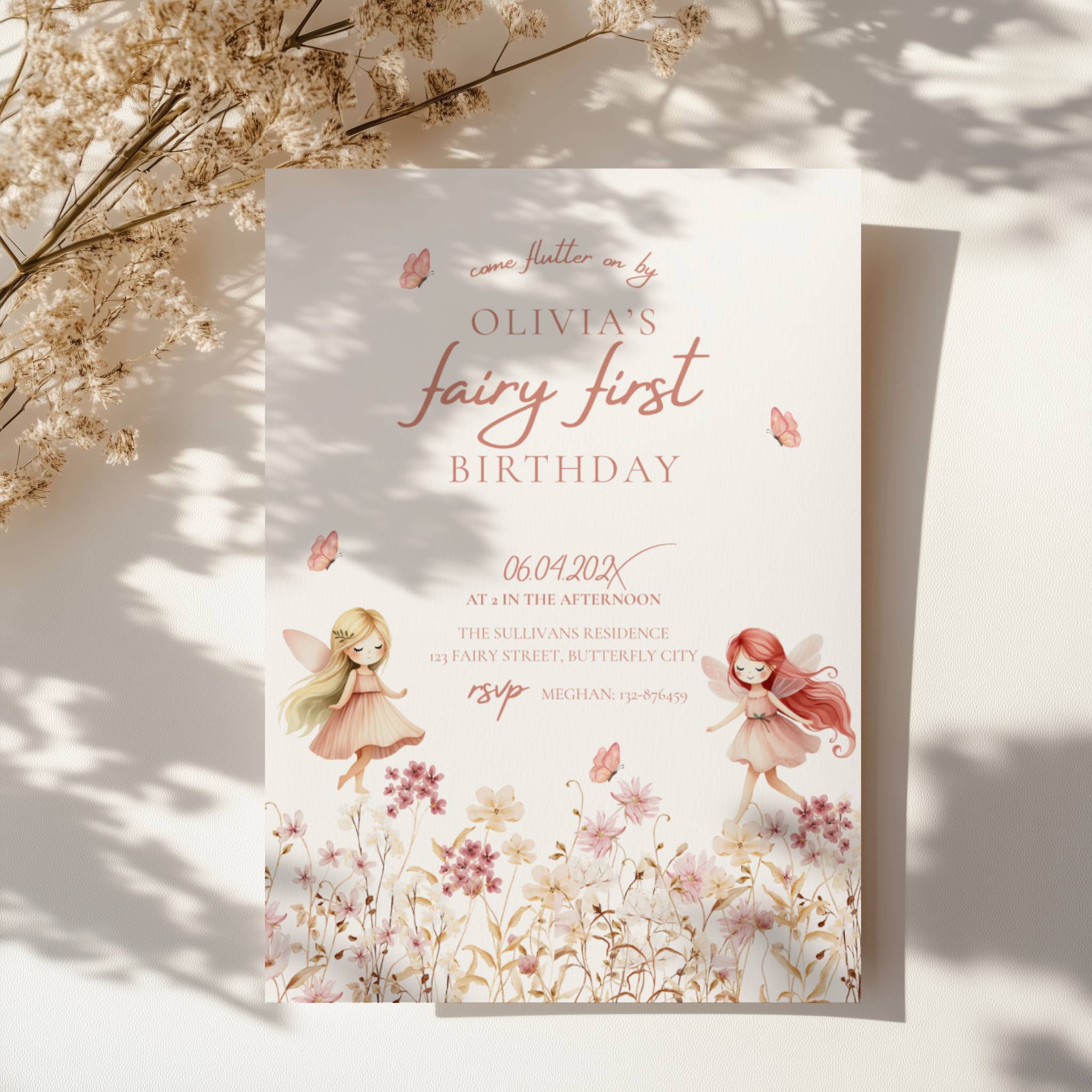 Fairy first birthday invitation with soft floral wildflower design and pastel colors