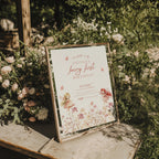 Fairy first birthday invitation with soft floral wildflower design and pastel colors