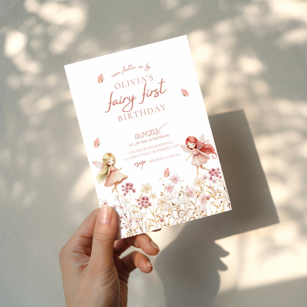 Fairy first birthday invitation with soft floral wildflower design and pastel colors
