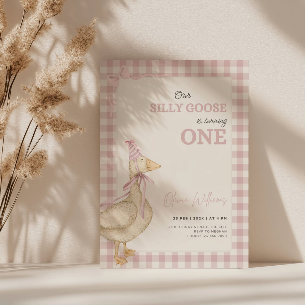 one silly goose first birthday invitation with pink gingham background and bow details