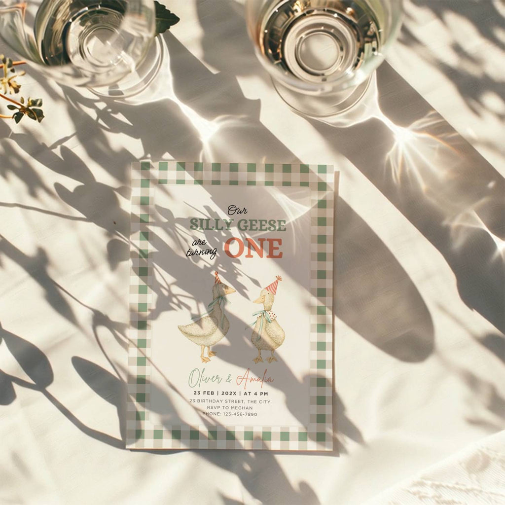 silly geese twins first birthday invitation with vintage geese and sage green gingham background