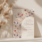 two babies in bloom twin baby shower invitation with pastel floral arch in blush and blue tones