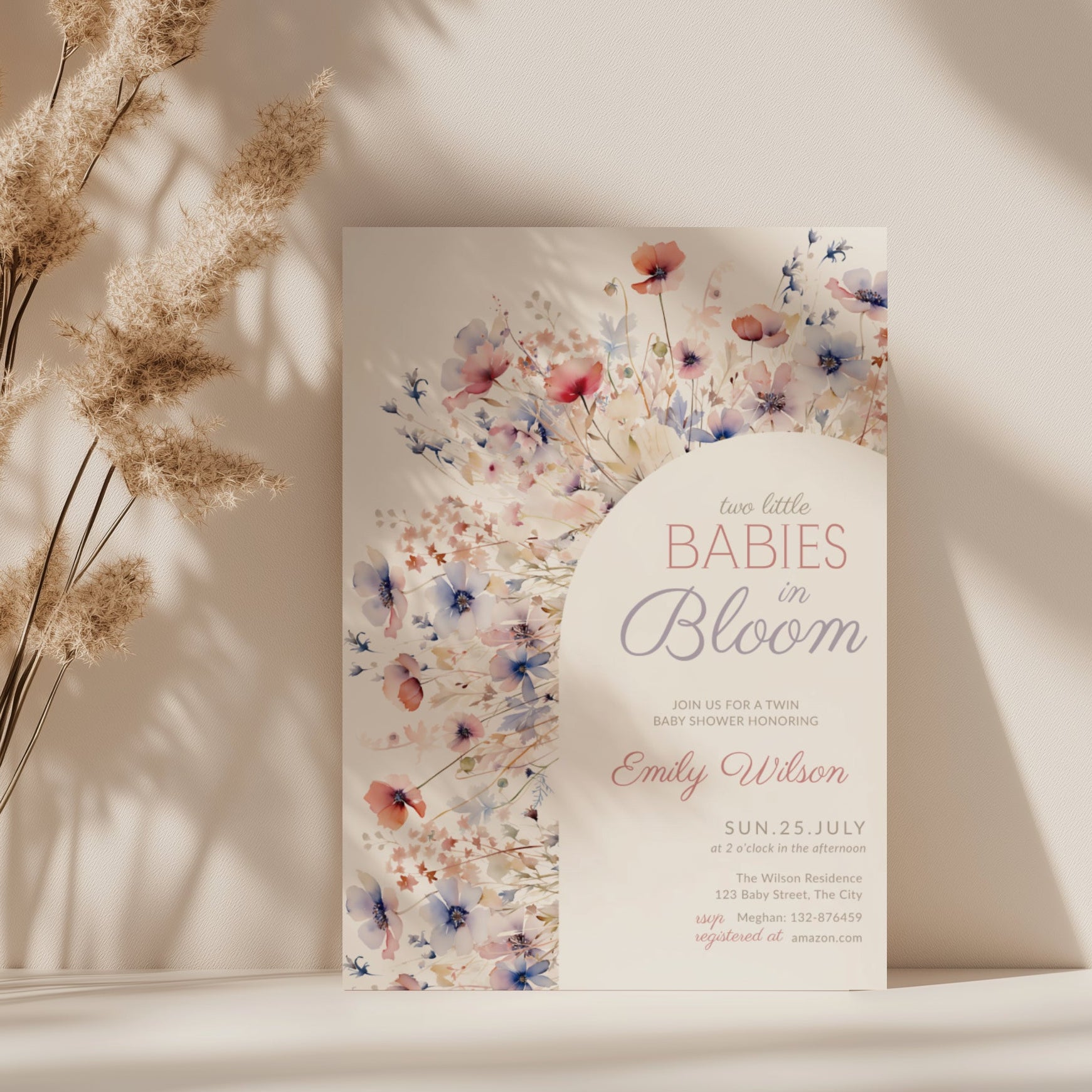 two babies in bloom twin baby shower invitation with pastel floral arch in blush and blue tones