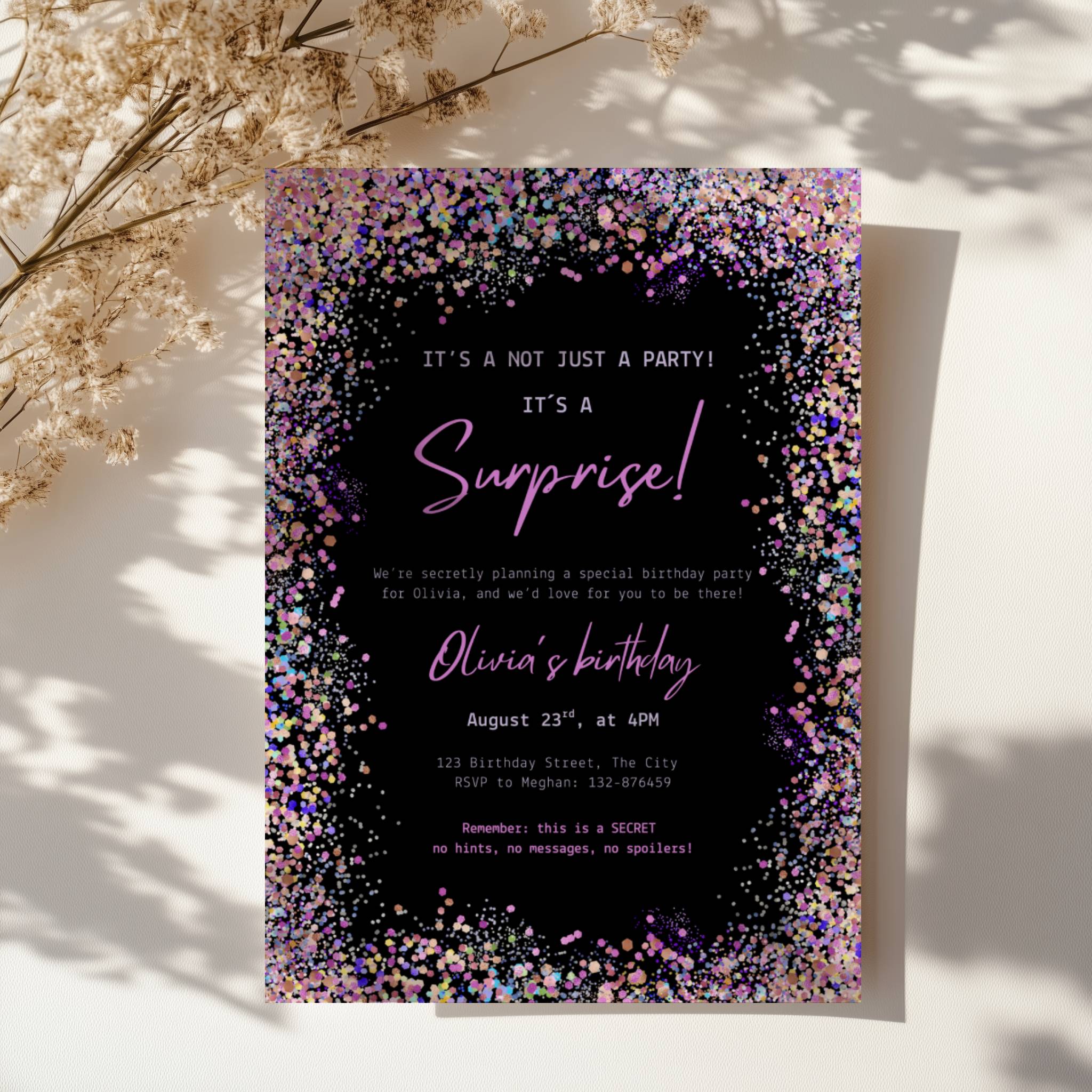 surprise birthday invitation with colorful confetti border on black background