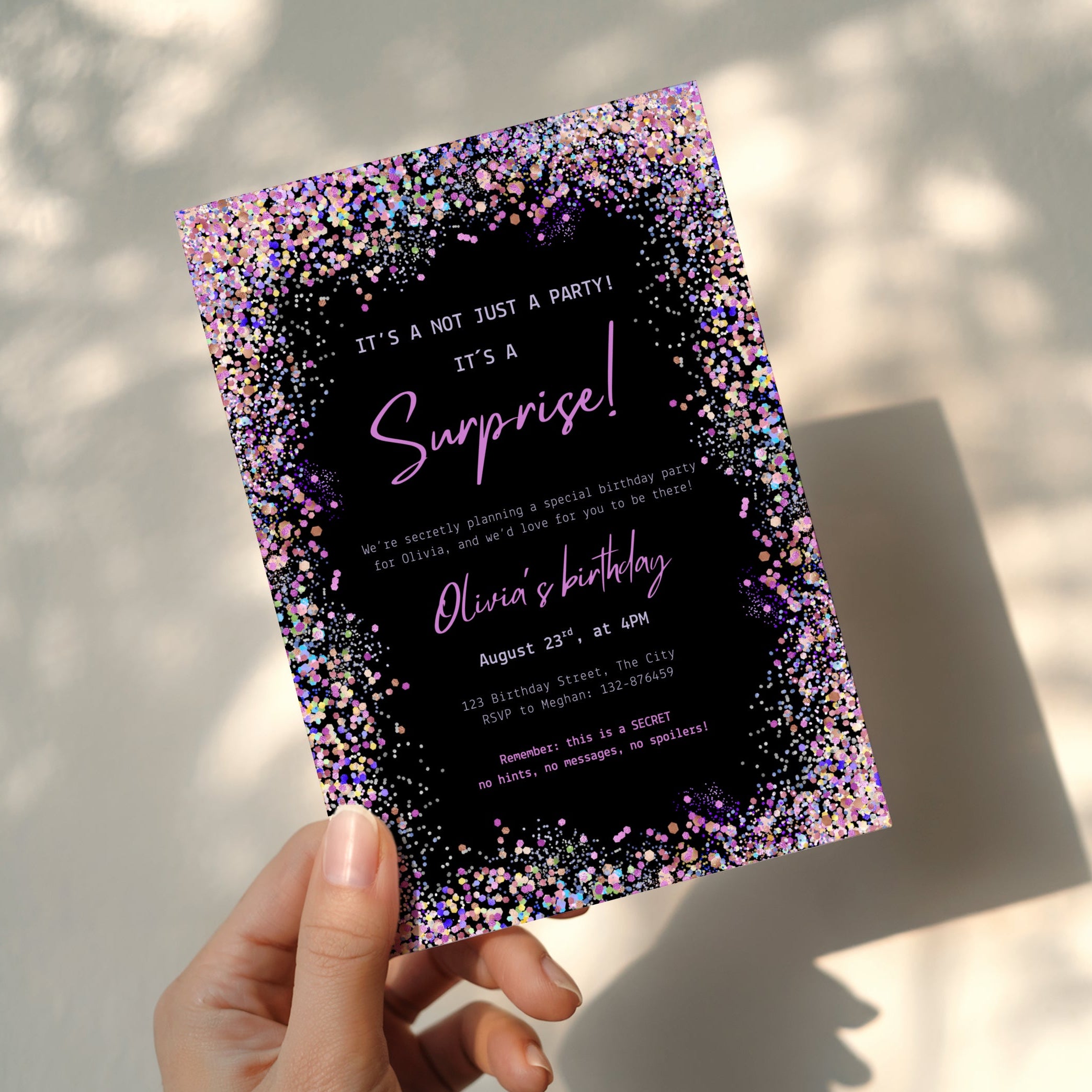 surprise birthday invitation with colorful confetti border on black background