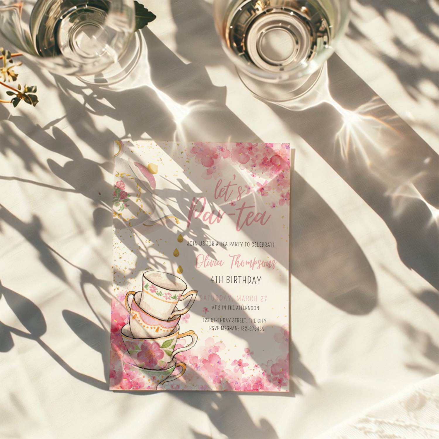 tea party birthday invitation with watercolor flowers and teacups in pink tones