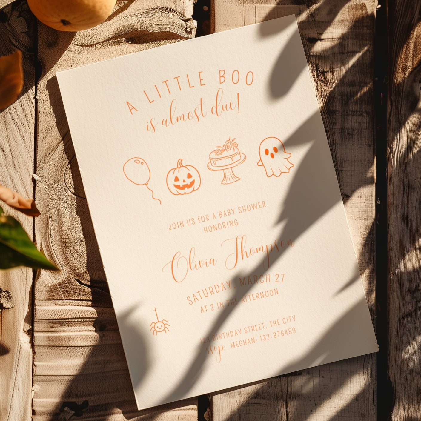 minimalist halloween baby shower invitation with orange line art pumpkin ghost and “little boo is almost due” text