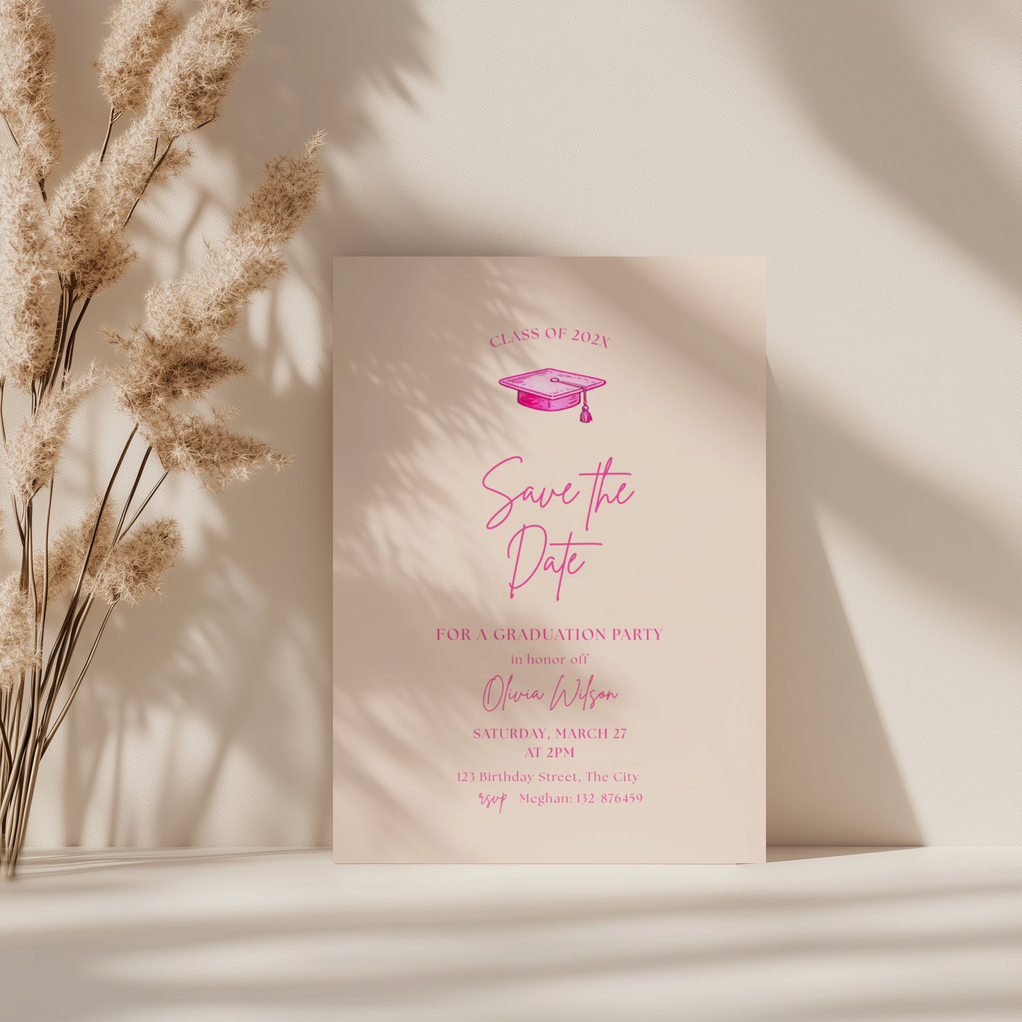 hot pink graduation save the date invitation with script text and graduation cap illustration