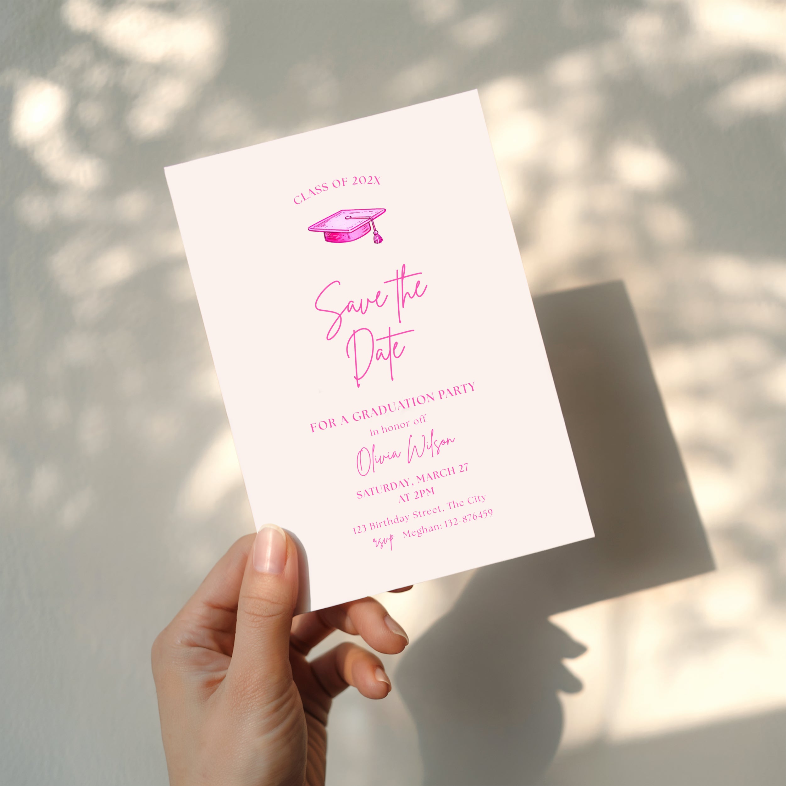 hot pink graduation save the date invitation with script text and graduation cap illustration