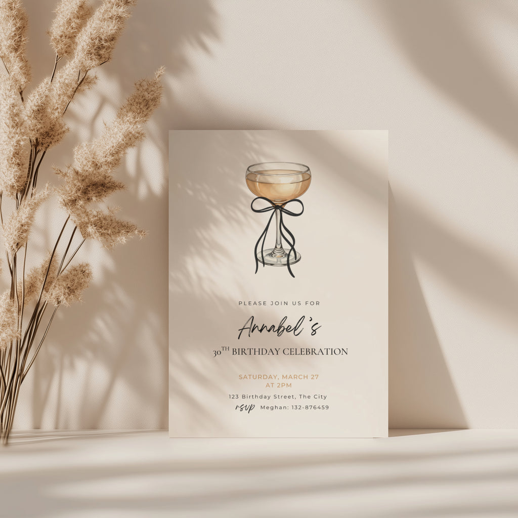 black bow minimalist 30th birthday invitation with champagne glass illustration and elegant typography