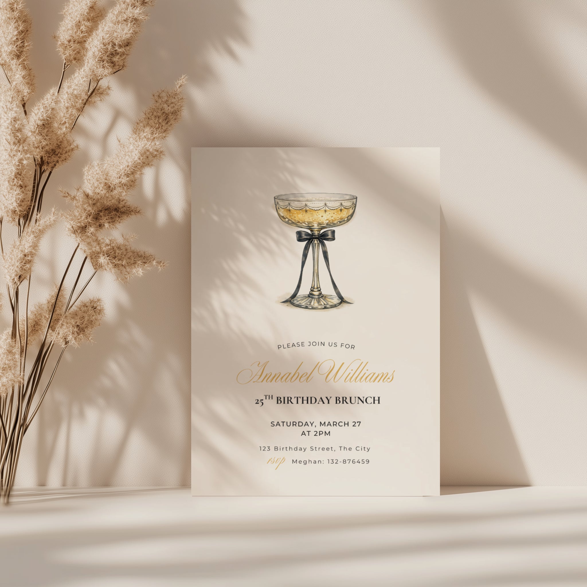 elegant 25th birthday brunch invitation with champagne glass and black bow illustration and gold script text