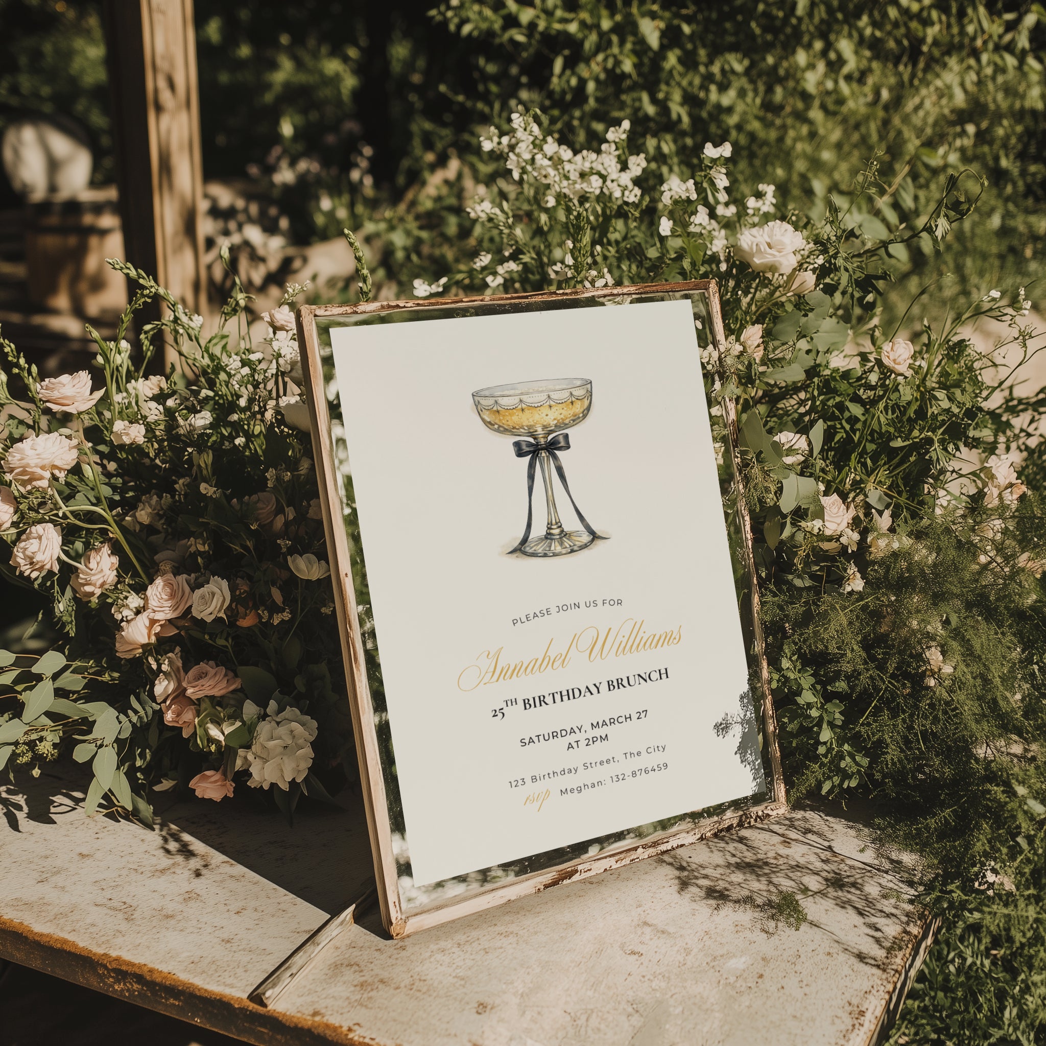 elegant 25th birthday brunch invitation with champagne glass and black bow illustration and gold script text