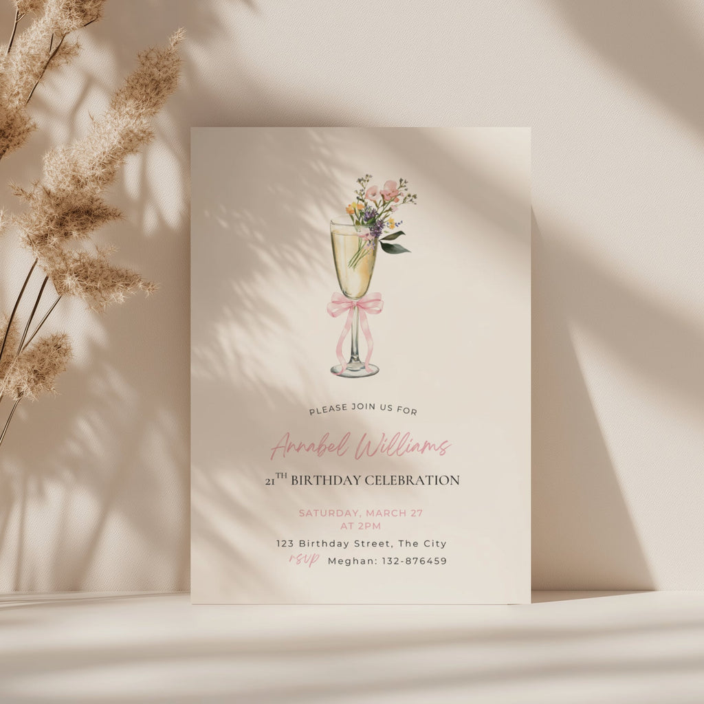 elegant 21st birthday invitation with champagne flute, flowers, and pink bow design