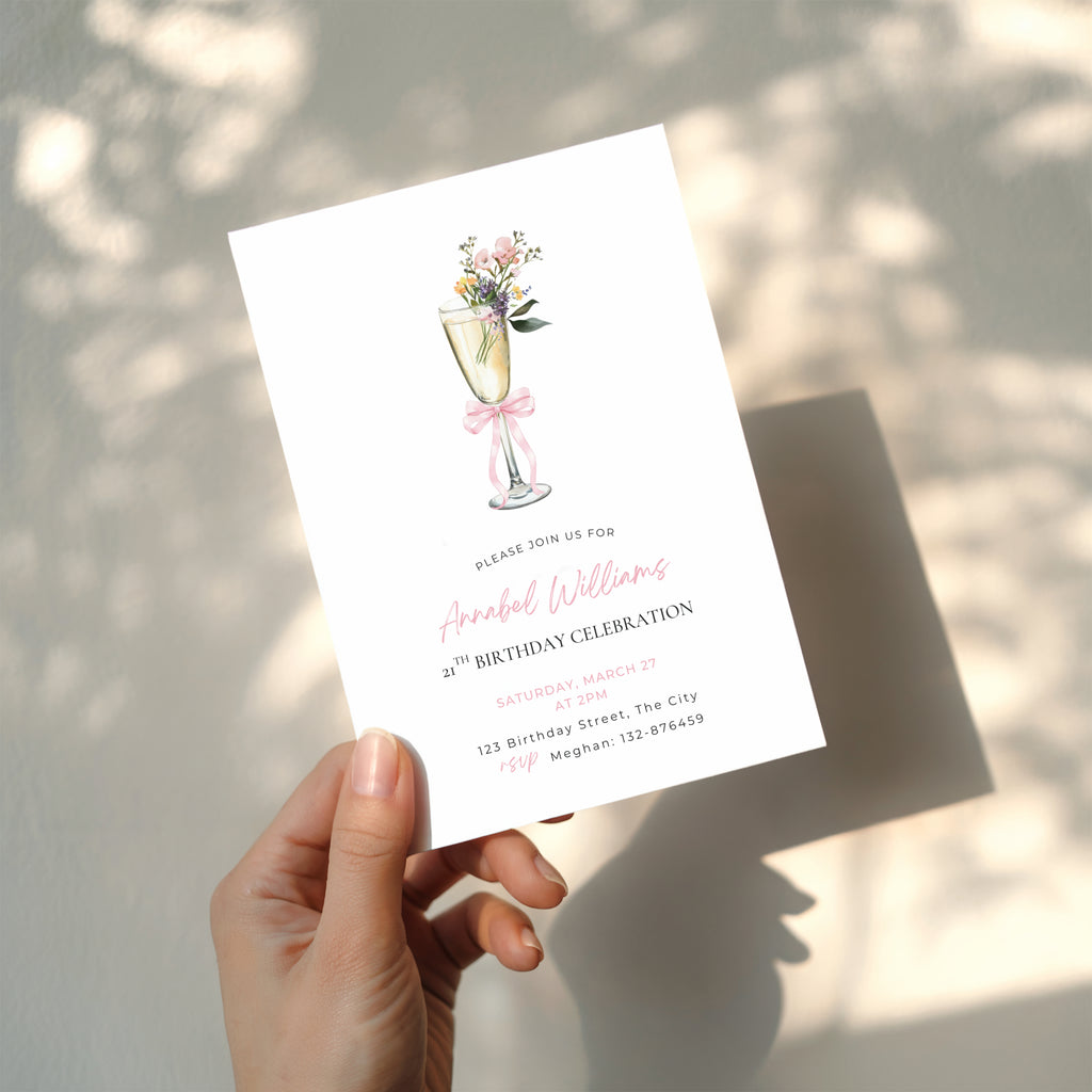 elegant 21st birthday invitation with champagne flute, flowers, and pink bow design