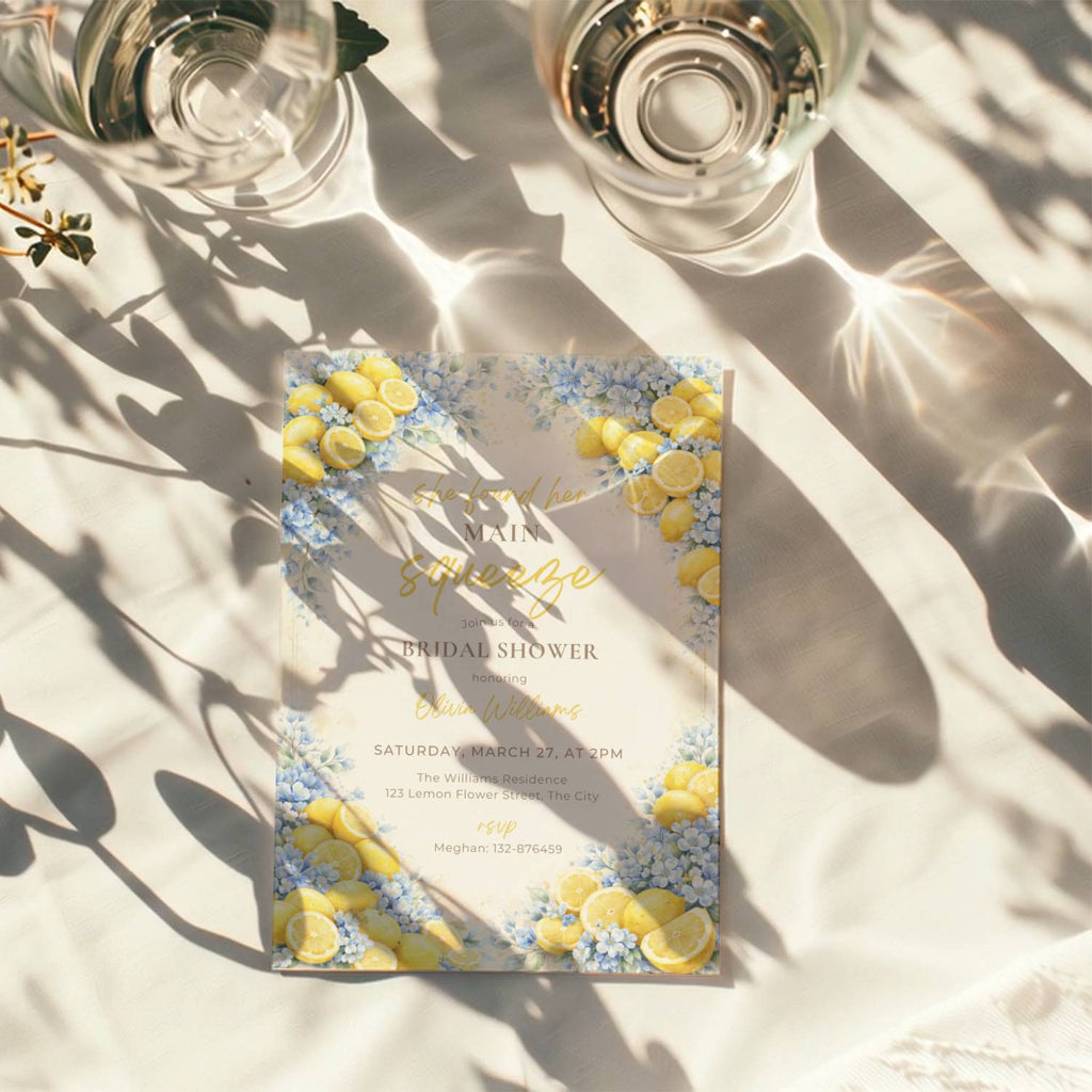 lemon bridal shower invitation with blue flowers and “main squeeze” text design