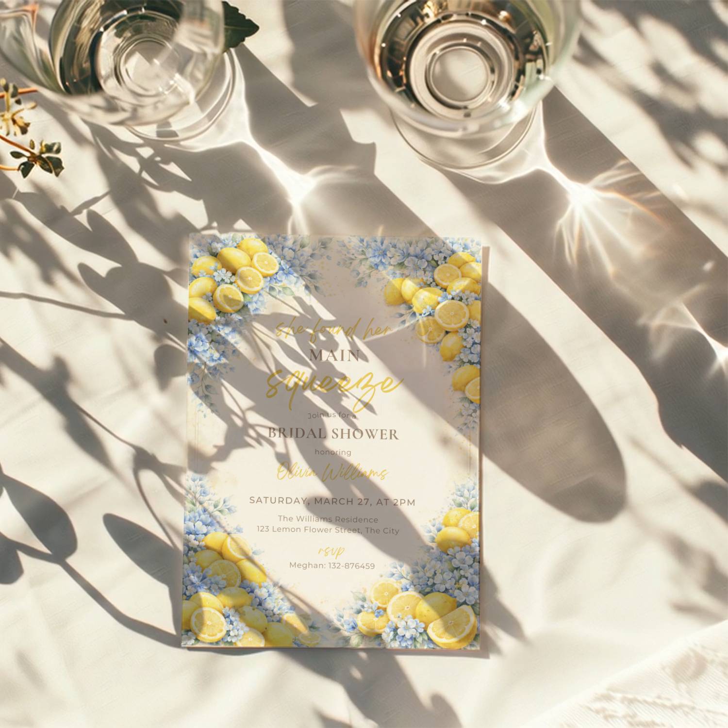 lemon bridal shower invitation with blue flowers and “main squeeze” text design