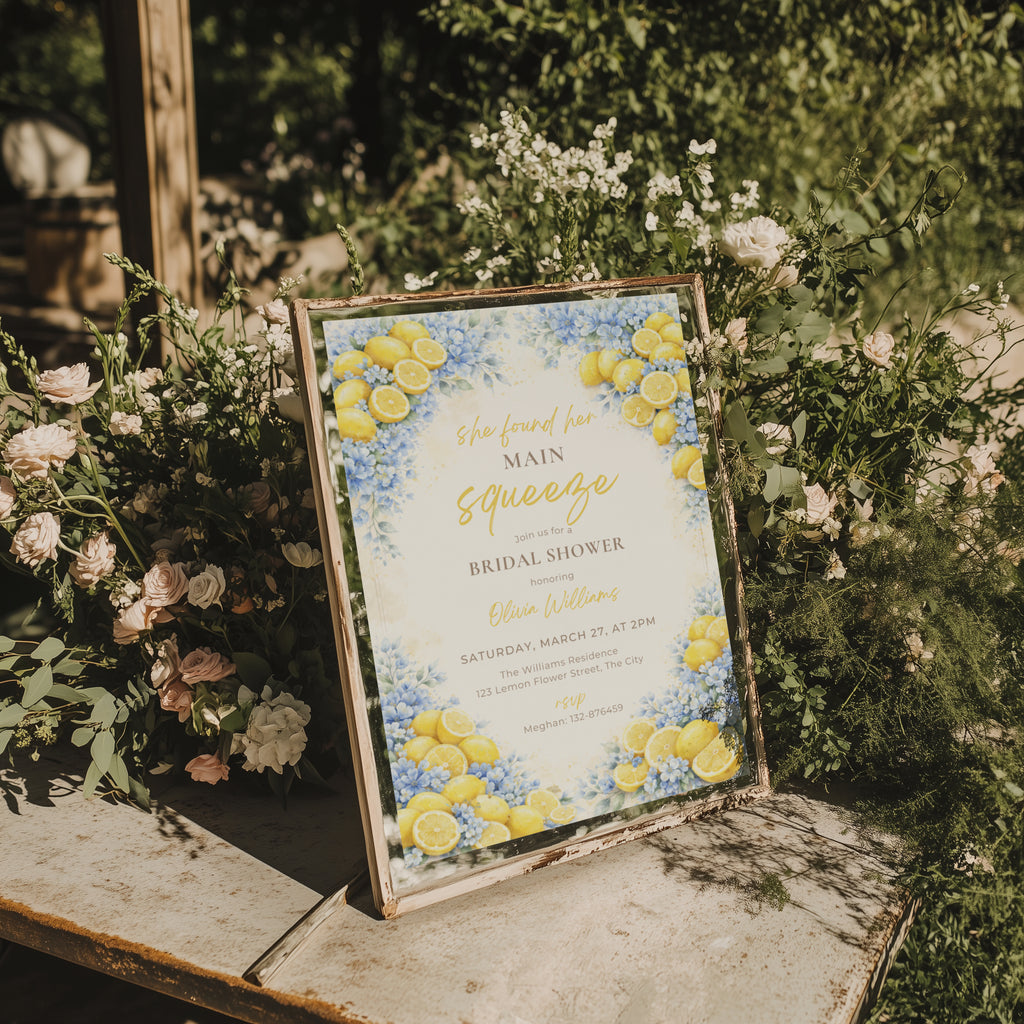 lemon bridal shower invitation with blue flowers and “main squeeze” text design