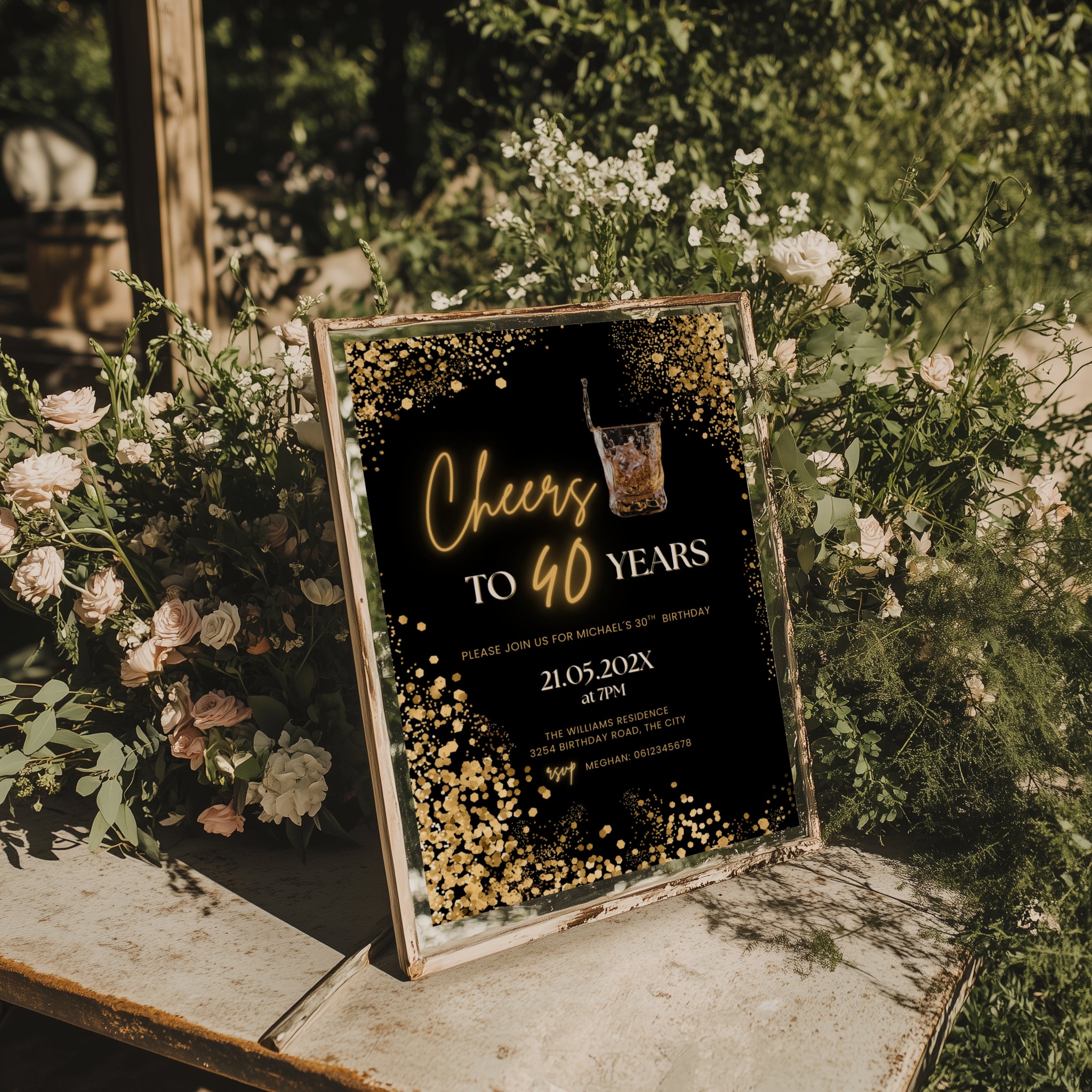 black and gold 40th birthday invitation with confetti, glowing text, and whiskey glass illustration