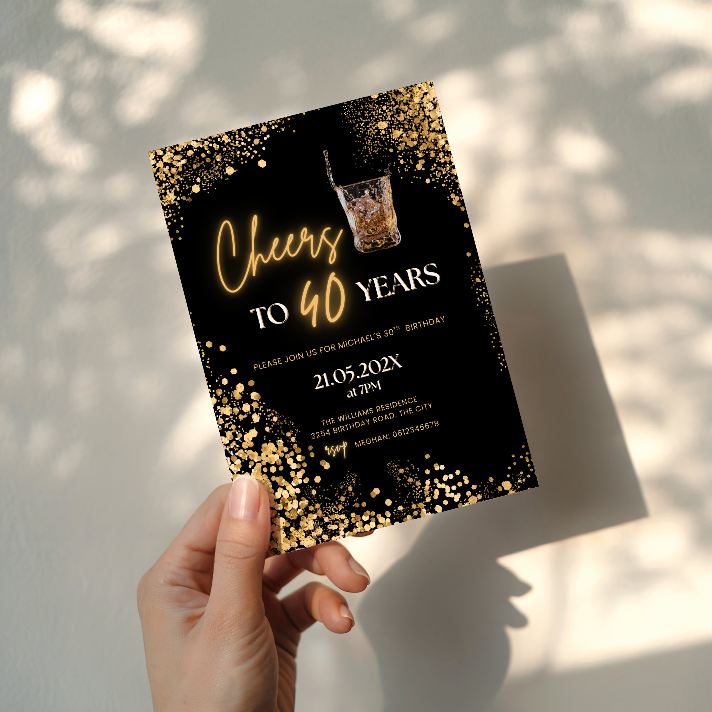black and gold 40th birthday invitation with confetti, glowing text, and whiskey glass illustration