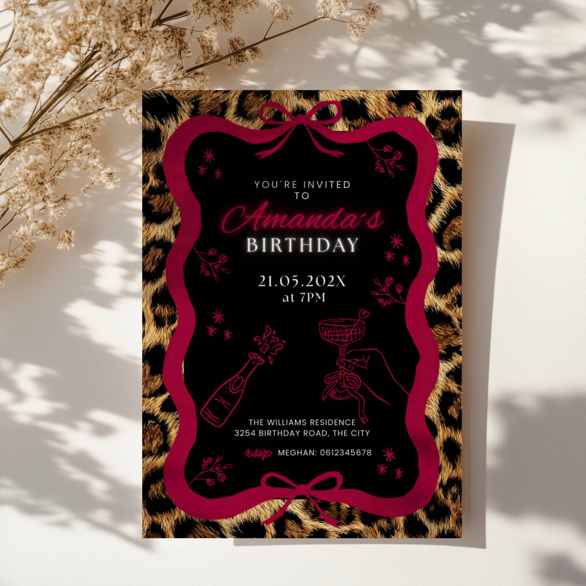 cheetah print birthday invitation with neon text and glam party design with red bow