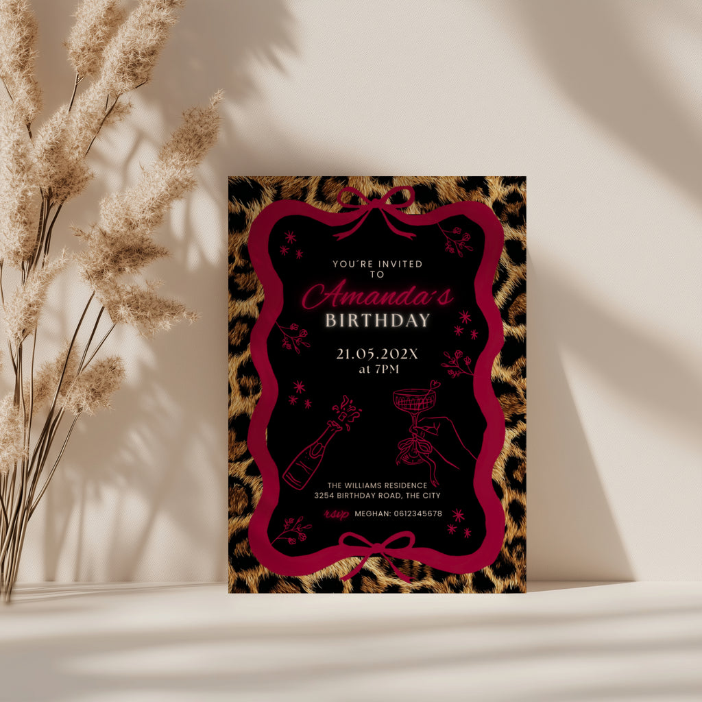 cheetah print birthday invitation with neon text and glam party design with red bow