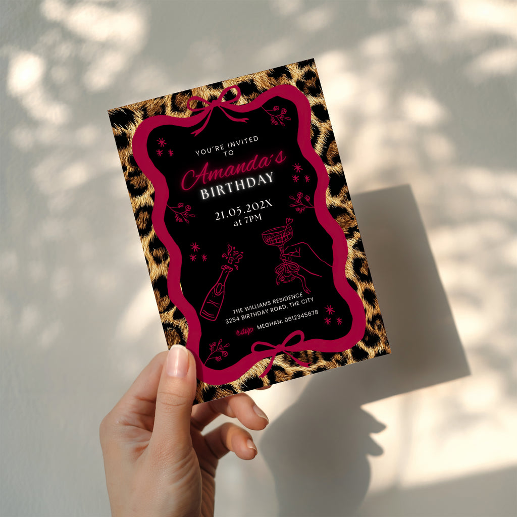 cheetah print birthday invitation with neon text and glam party design with red bow