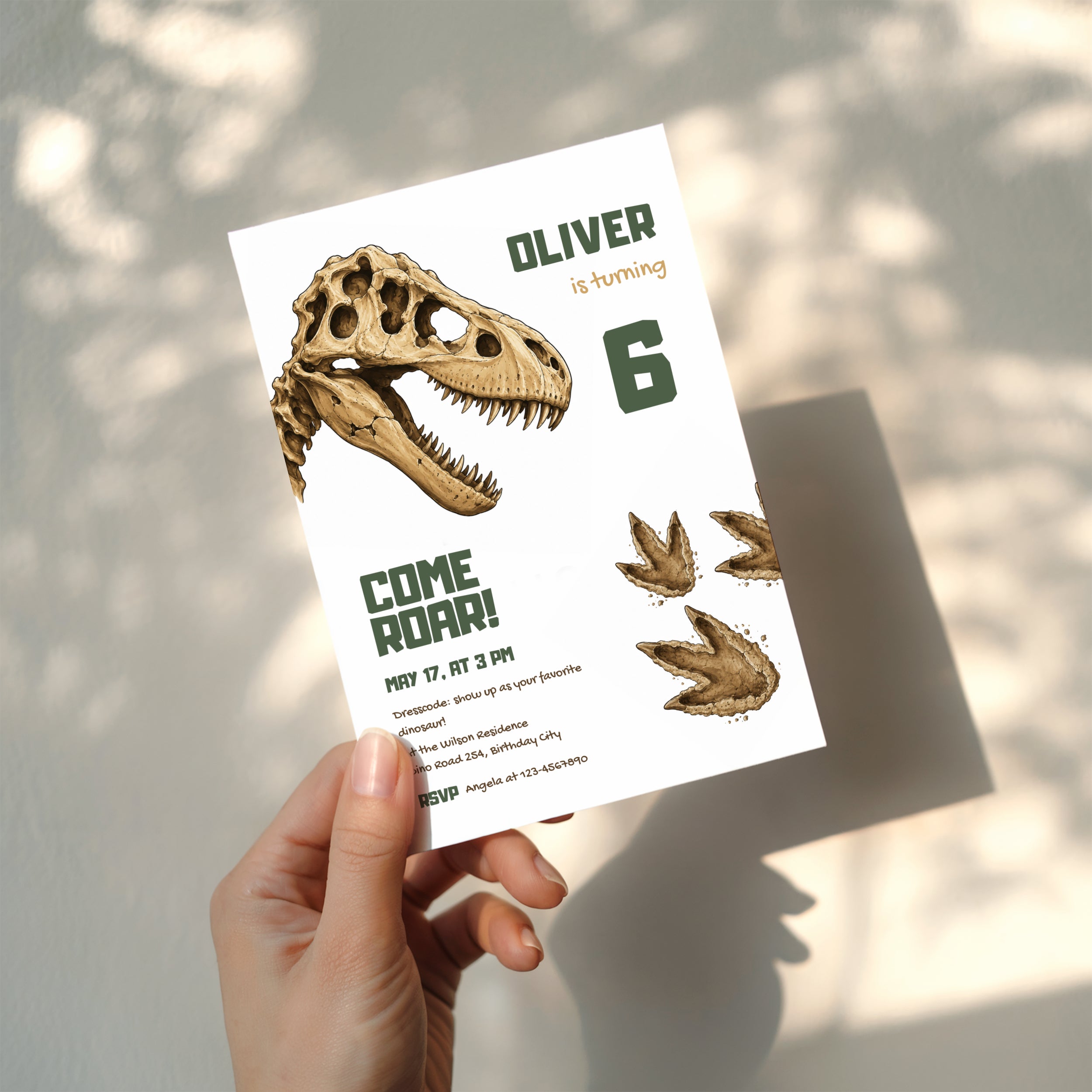 Editable dinosaur fossil birthday invitation featuring a realistic T-Rex skull and prehistoric footprints Canva template