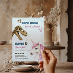 Editable dinosaur unicorn twin birthday invitation featuring a realistic dinosaur fossil and magical unicorn Canva template