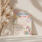 Editable cute rainbow unicorn birthday invitation with baby unicorns, pastel rainbow and watercolor details Canva template