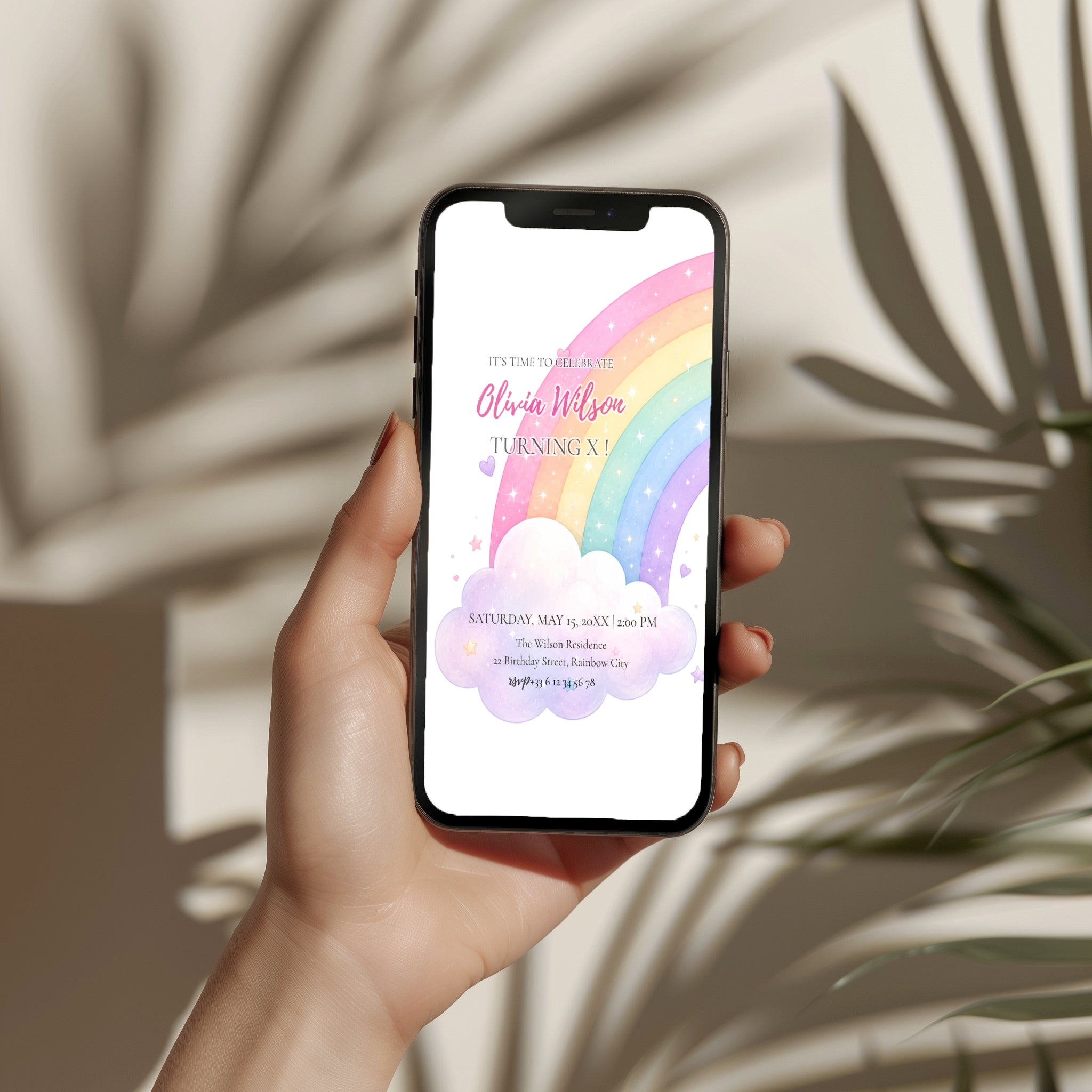 Editable pastel rainbow birthday invitation featuring a watercolor rainbow, fluffy clouds and soft pastel colors Canva template