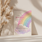 Editable pastel rainbow birthday invitation featuring a watercolor rainbow, fluffy clouds and soft pastel colors Canva template