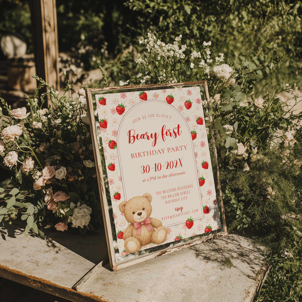 Editable Berry & Beary First birthday invitation with a teddy bear, strawberries, pink flowers, and an elegant arched design for a girl's first birthday party.